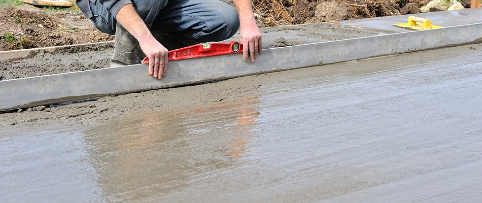 Professional measuring concrete slab in Middleburg, VA.