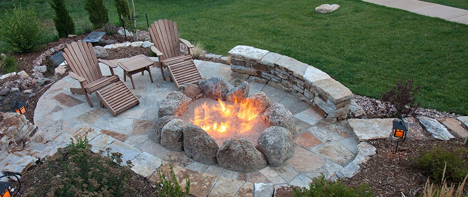 A fire pit area with chairs in Middleburg, VA.