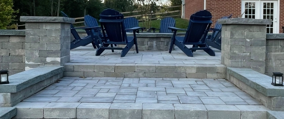 Fire pit with custom patio and steps built with pavers in Rappahannock County, VA.